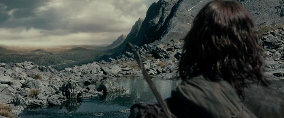 Aragorn spots Lothlórien and the Silverlode in the distance.