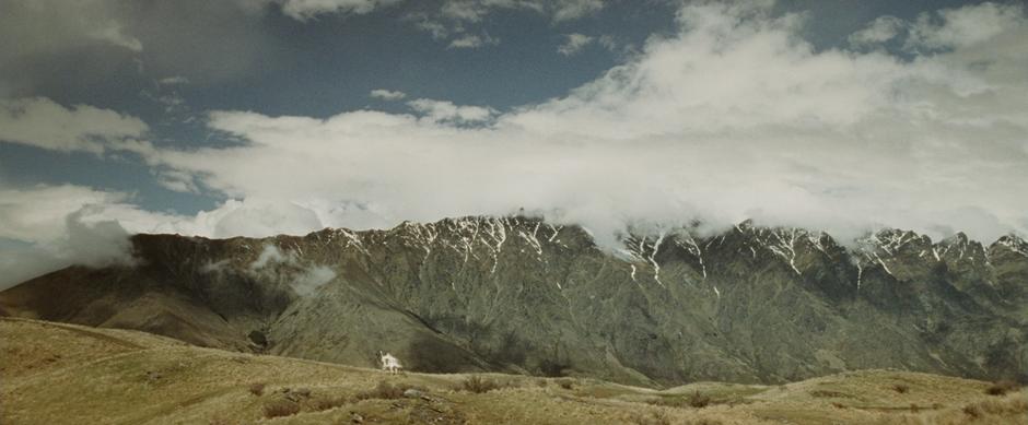 Gandalf and Pippin ride up the hill on their way to Minas Tirith.