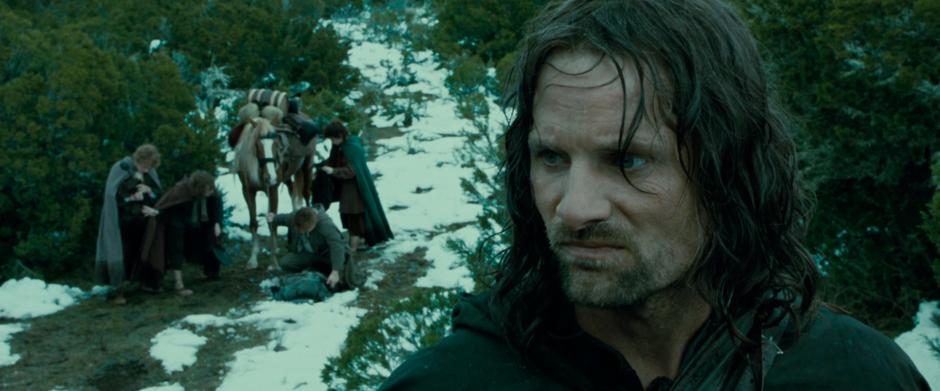 Aragorn stops to survey the terrain and the Hobbits take this as a cue to have second breakfast.