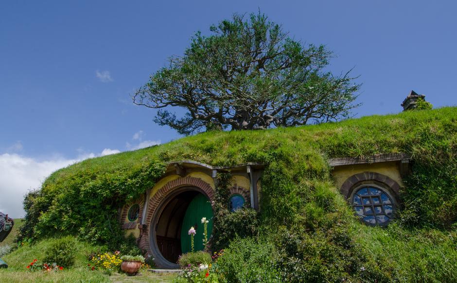 The front entrance to Bag End with its tree in the background.
