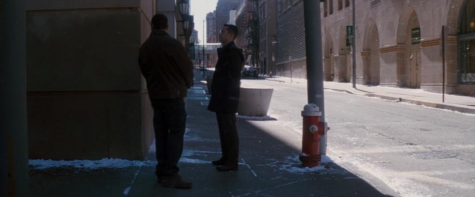 Blake and Captain Jones wait for the bomb truck to pass.