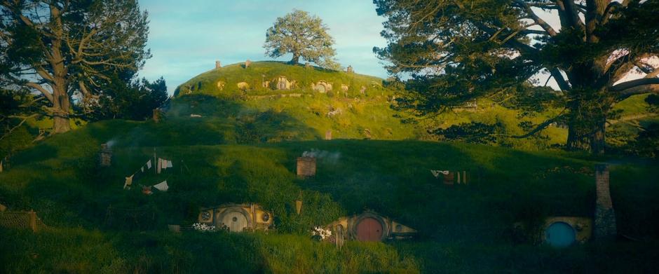 Establishing shot of Bag End look from the lake.