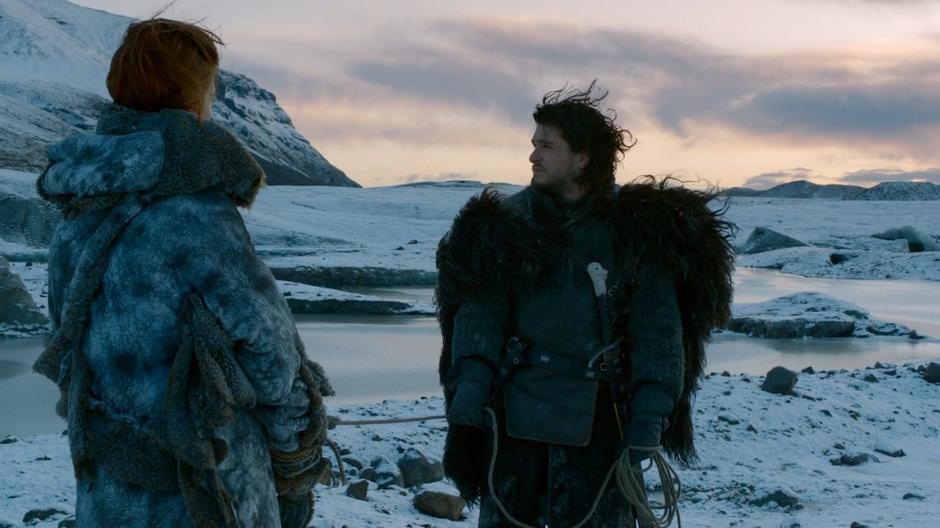 Ygritte argues with Jon Show in the shore of a frozen lake.