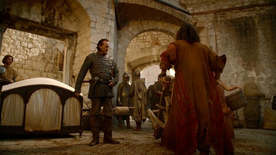 Bronn waits on the street while Tyrion talks with Lancel.