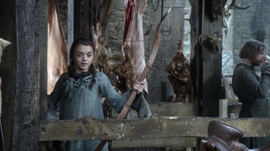 Arya looks smug after a perfect shot.