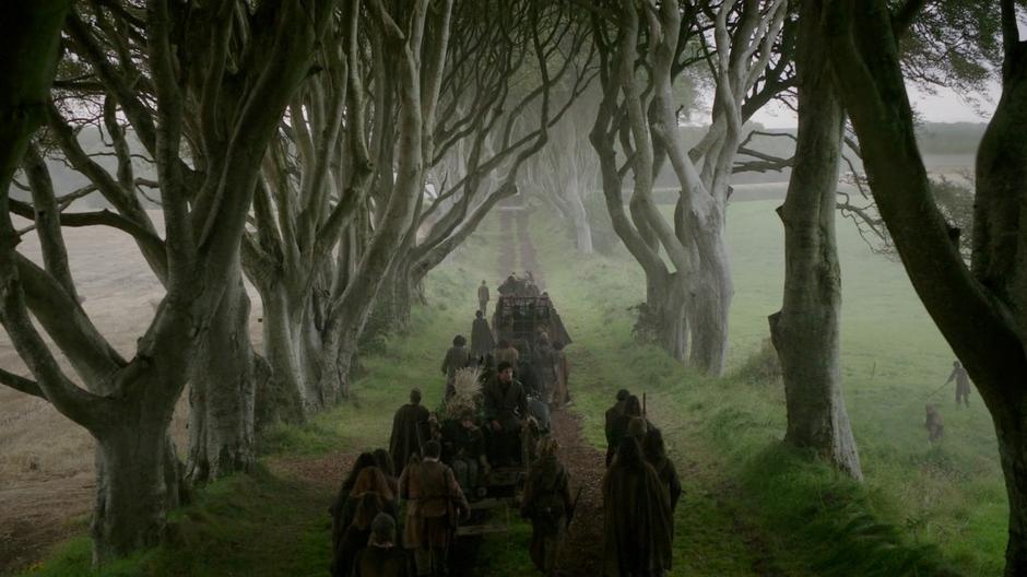 Arya and Gendry ride on the cart with the rest of the party going north to The Wall.
