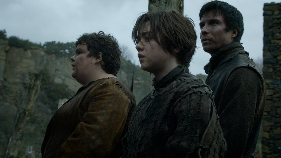 Arya, Gendry, and Hot Pie see Harrenhal for the first time.