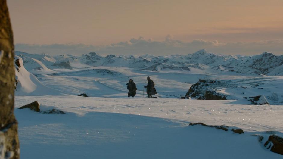 Two of the Night's Watch guards stand watch in the snow.