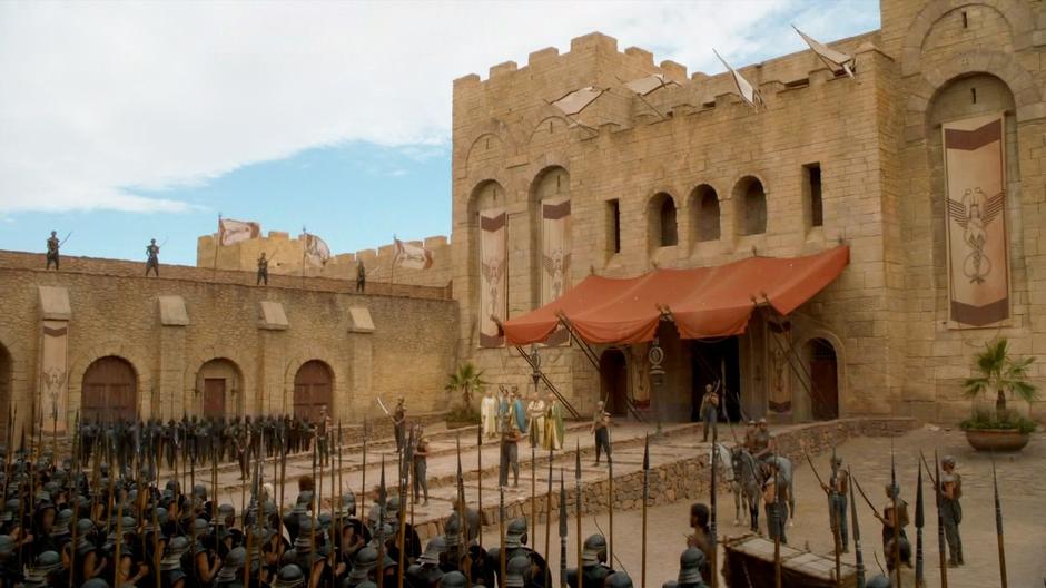 The Good Masters wait for Daenerys in front of the assembled Unsullied.