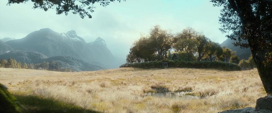 View across a field towards Beorn's front door.