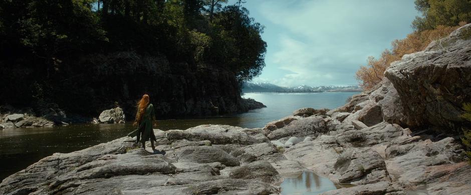 Tauriel looks out over the Long Lake towards Laketown.