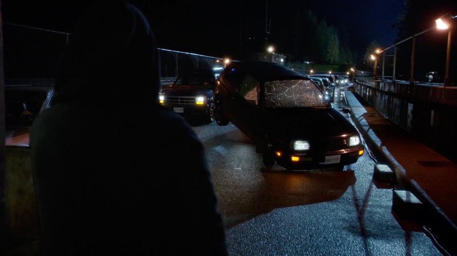 Hartley Rathaway lifts a car with his sonic gloves.