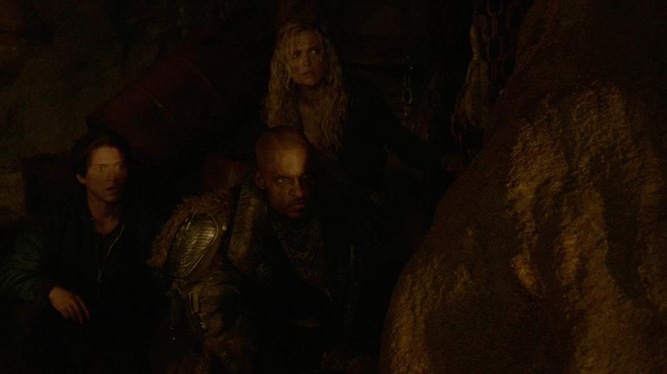 Clarke, Finn, and Lincoln look at the group of reapers.