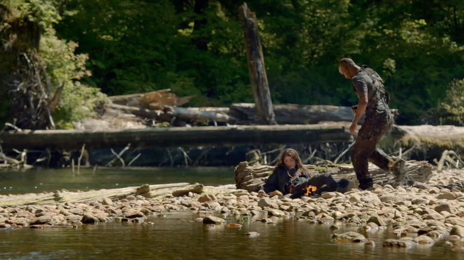 Lincoln approaches to help Octavia with her arrow wound.