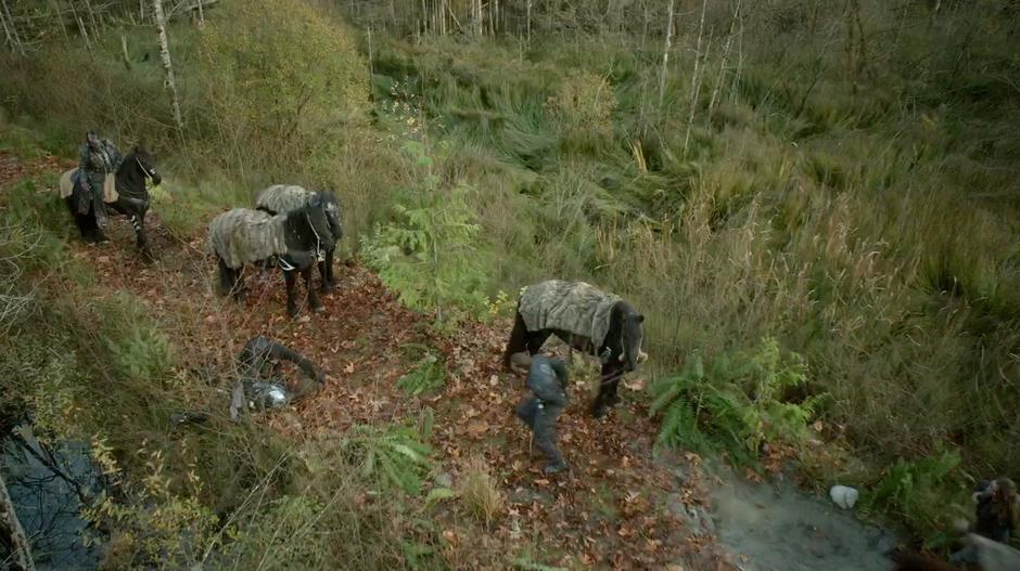 The members of the party scramble after one of the grounders is shot.