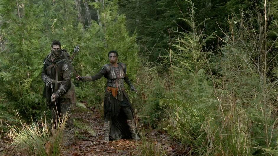Indra holds off her archer so Octavia can kill the spotter from Mount Weather.