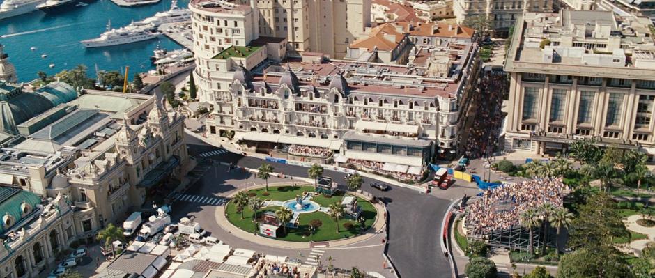 Wide shot of the hotel as Tony Stark drives up.