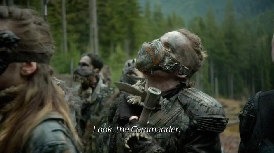 A Grounder yells at the others to pay attention.