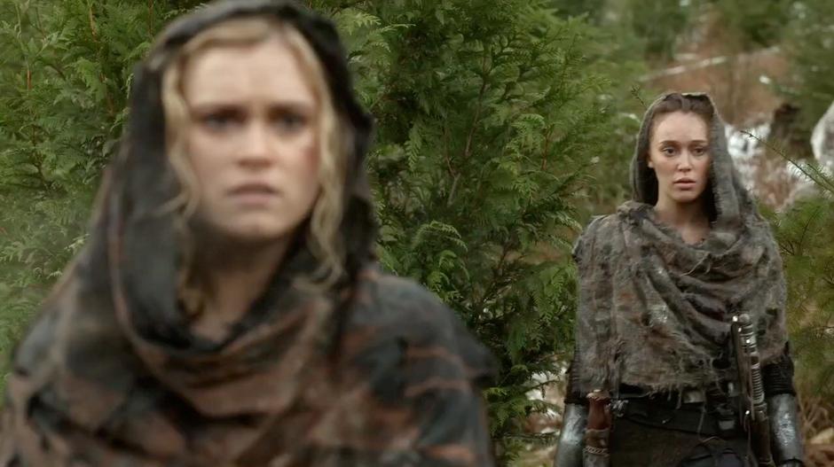 Lexa looks at the sniper who Clarke just shot through Lincoln.