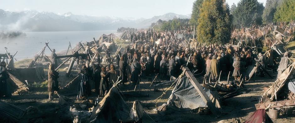 Refugees set up camp on a bluff above the lake.