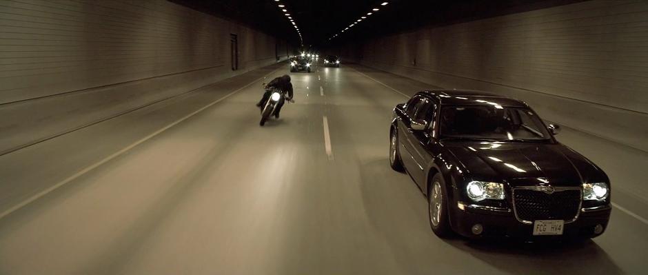 Sam races through a tunnel on his way to Encom.