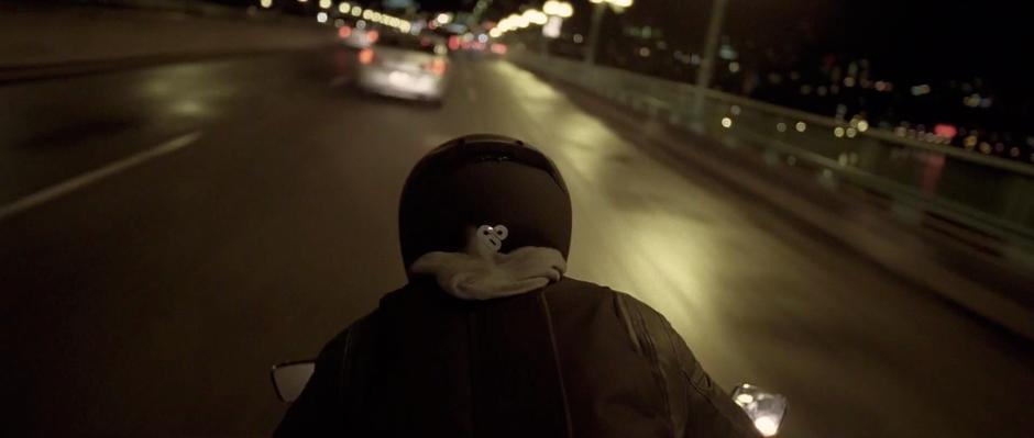 Sam Flynn races his motorcycle over the Cambie street bridge in Vancouver.