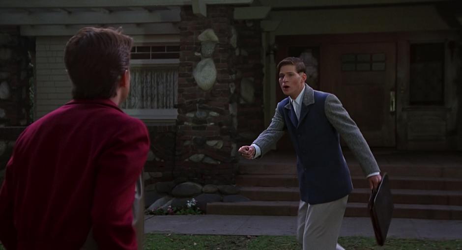 George and Marty argue outside George's house.