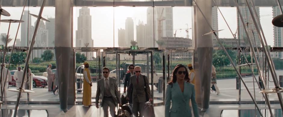 The Ghost Protocol team enters the lobby of the Burj Khalifa.