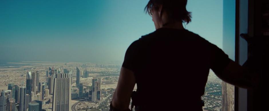 Ethan Hunt looks out over the Dubai skyline from the Burj Khalifa.