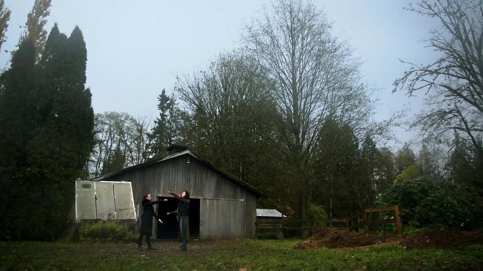 Julia and Kady cast the weather spell needed to draw out Reynard in front of a barn.