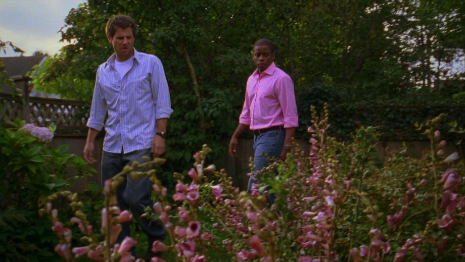 Shawn spots some strange flowers in the garden as he and Gus are walking around back.