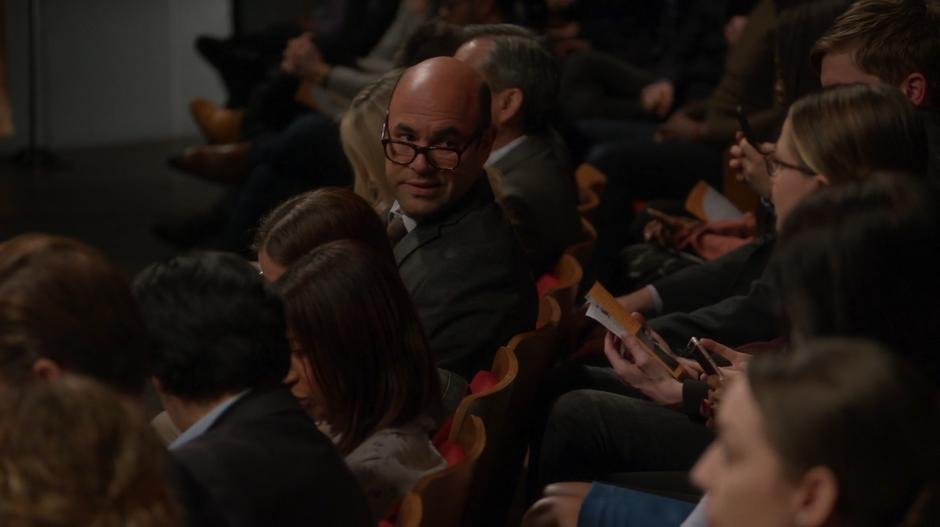 Snapper makes a comment back at Kara from where he is sitting in the audience.