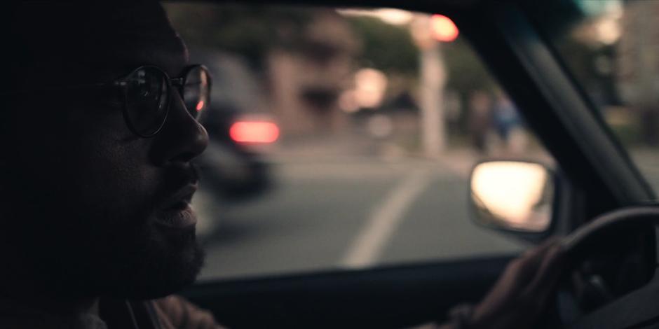 Luke drives through an intersection around the corner from the hospital.