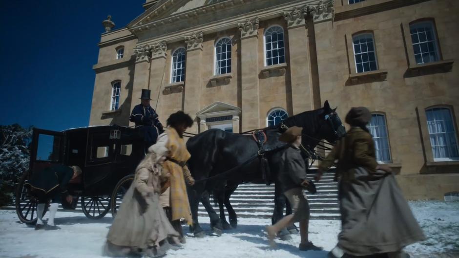 The four urchins exit the carriage and walk up to the front of the manor.