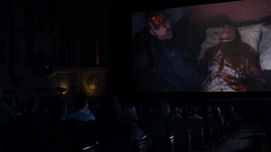 Bug talks to Lito's visitation while the film shows Lito's character on the screen covered in blood.