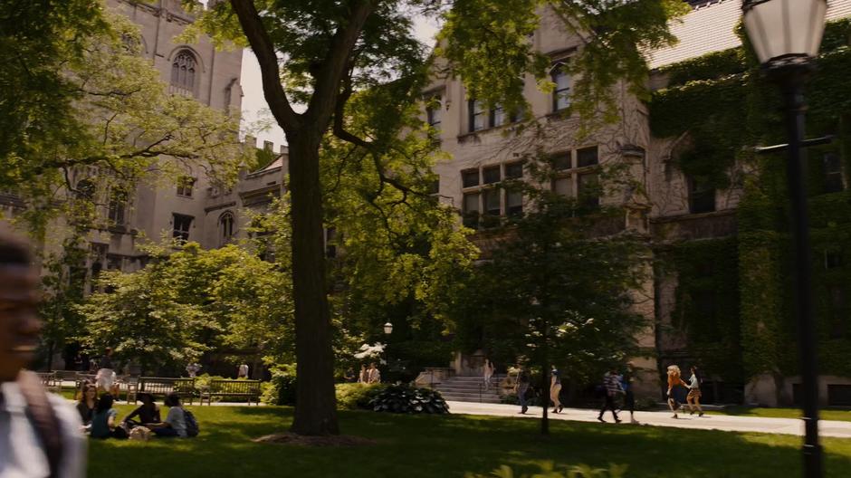 Nomi and Amanita run past students through the quad.