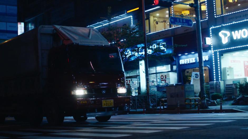 A truck approaches the intersection.