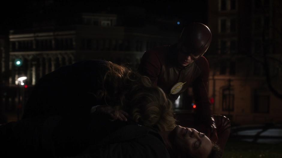 Barry looks on as Tracy cries over H.R.'s body.