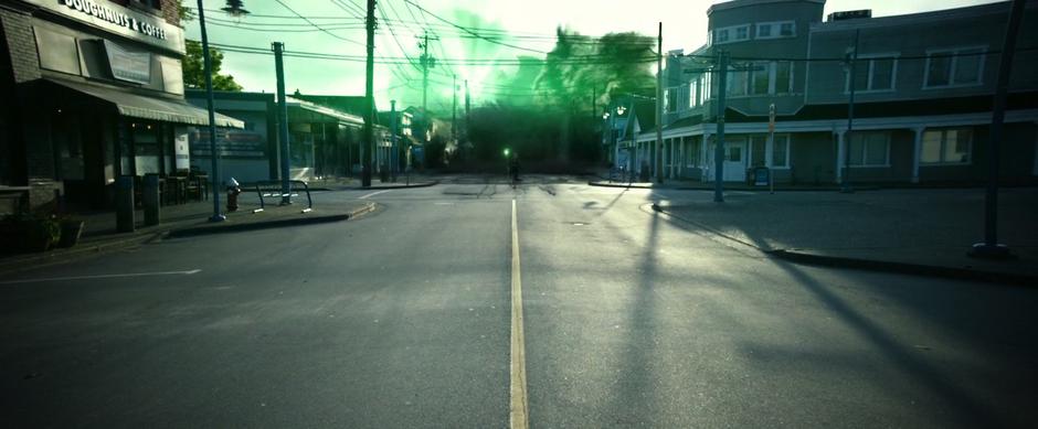 In Jason's vision, Rita walks down the street while the town is destroyed behind her.