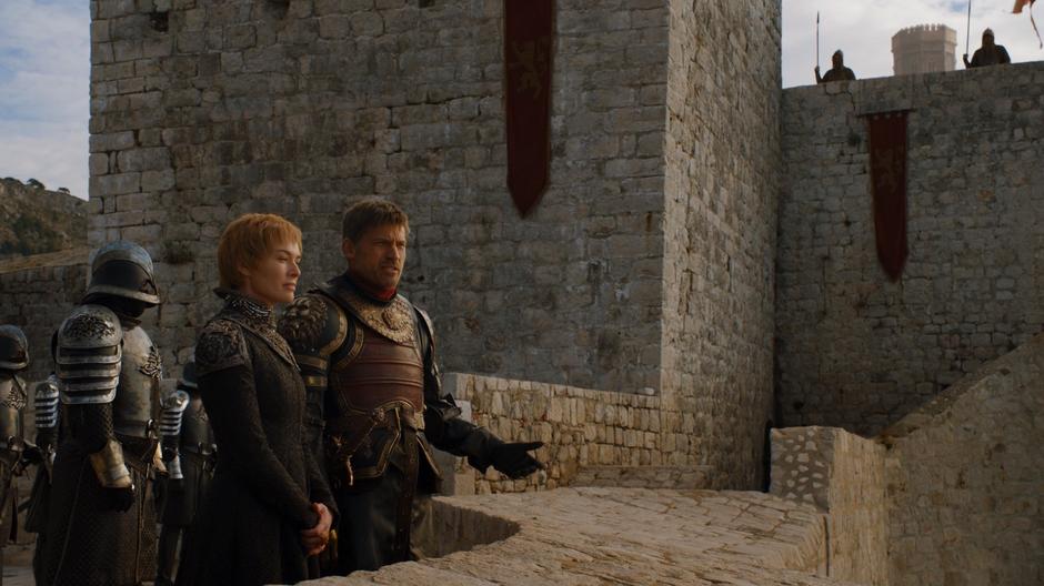 Jaime tries to argue against getting help from the Iron Isles to Cersei while her guards stand behind them.