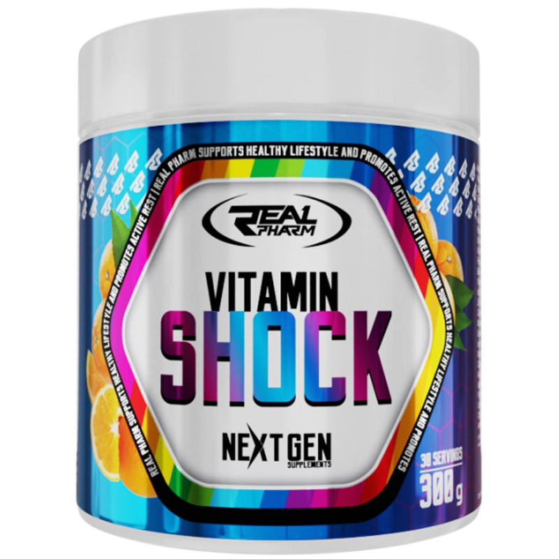 Real Pharm Vitamin Shock 300g w opakowaniu o smaku pomarańczowym