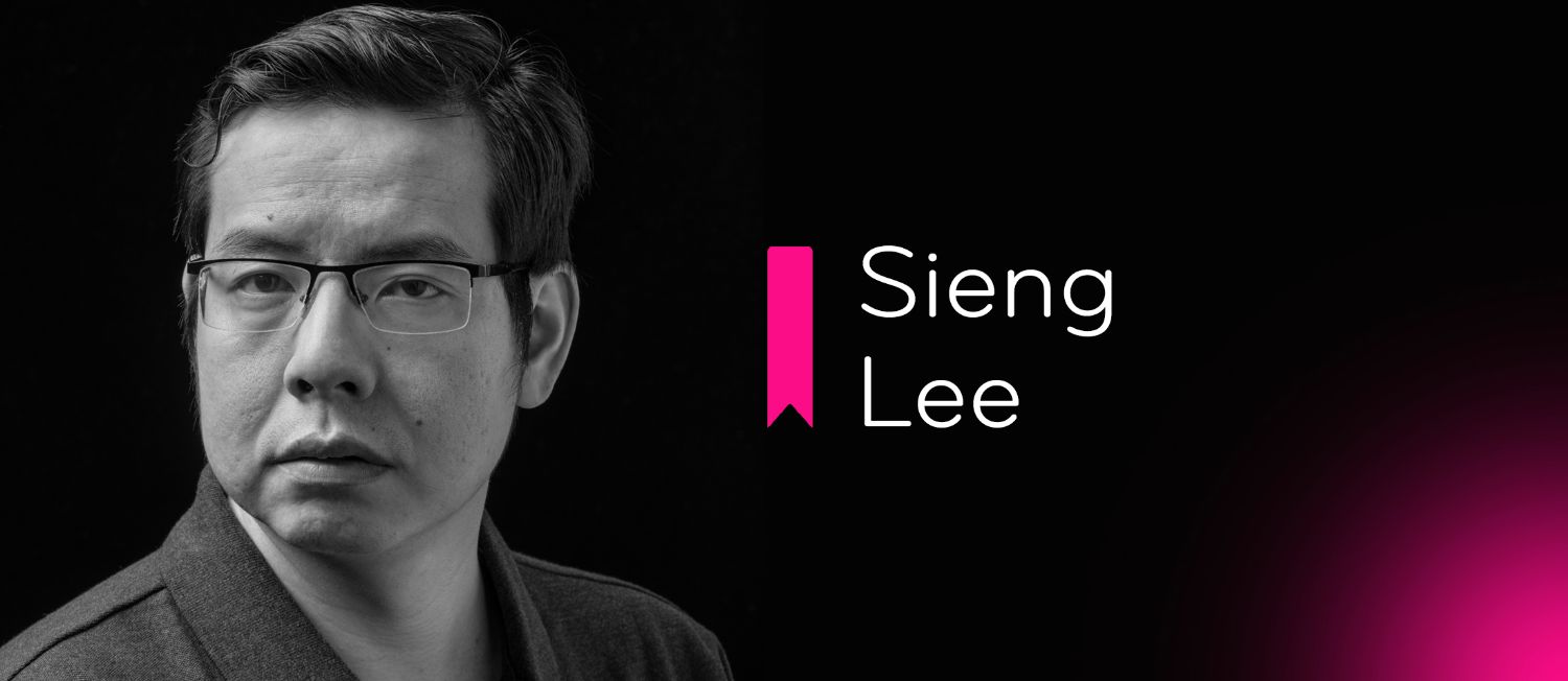 Asian man on black background with pink light in corner. "Sieng Lee"