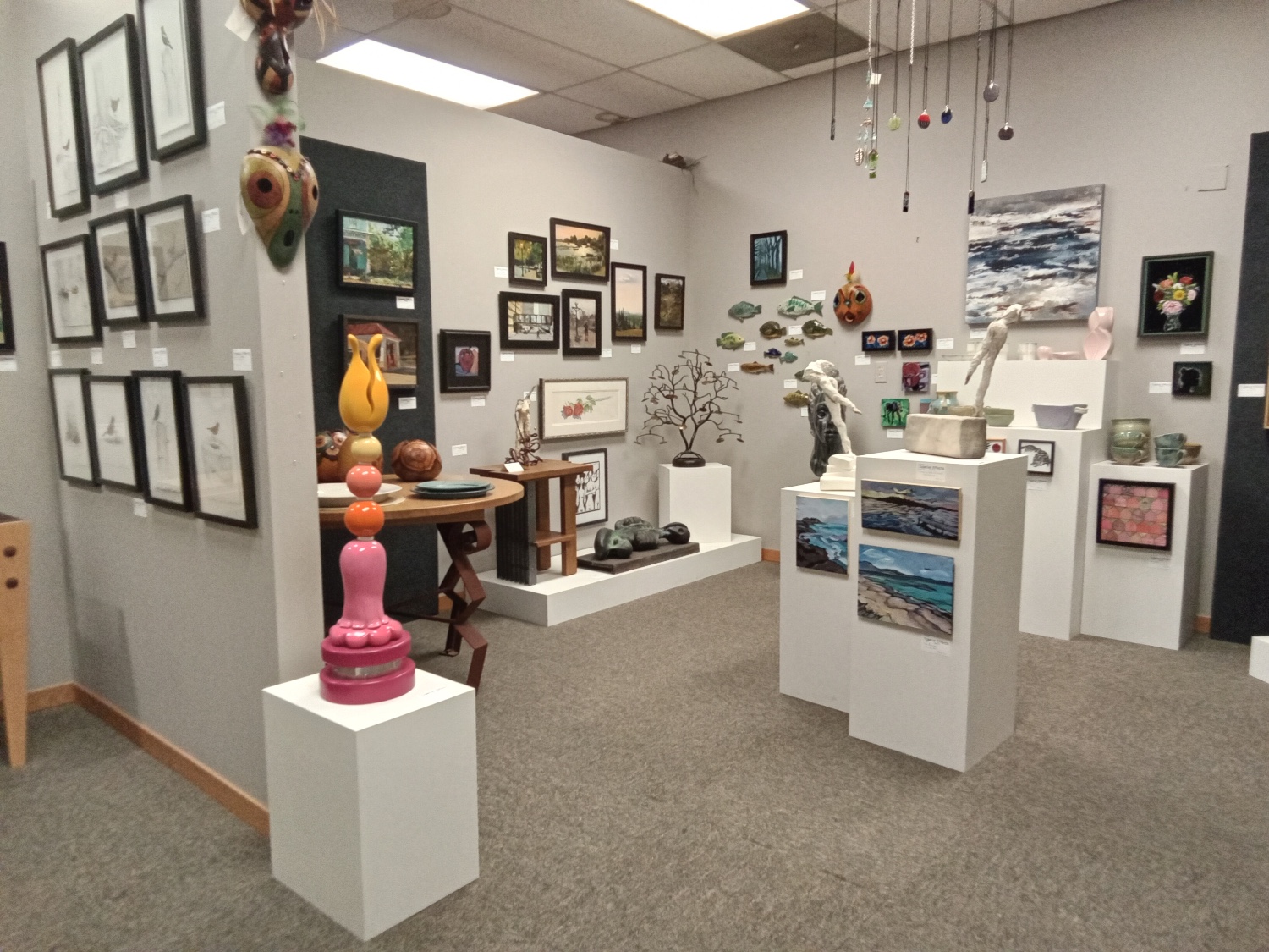 Artworks on display in a commercial art gallery