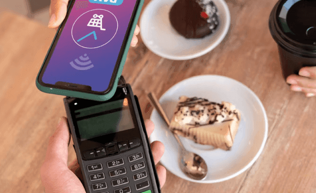 An NFC payment made at a restaurant table