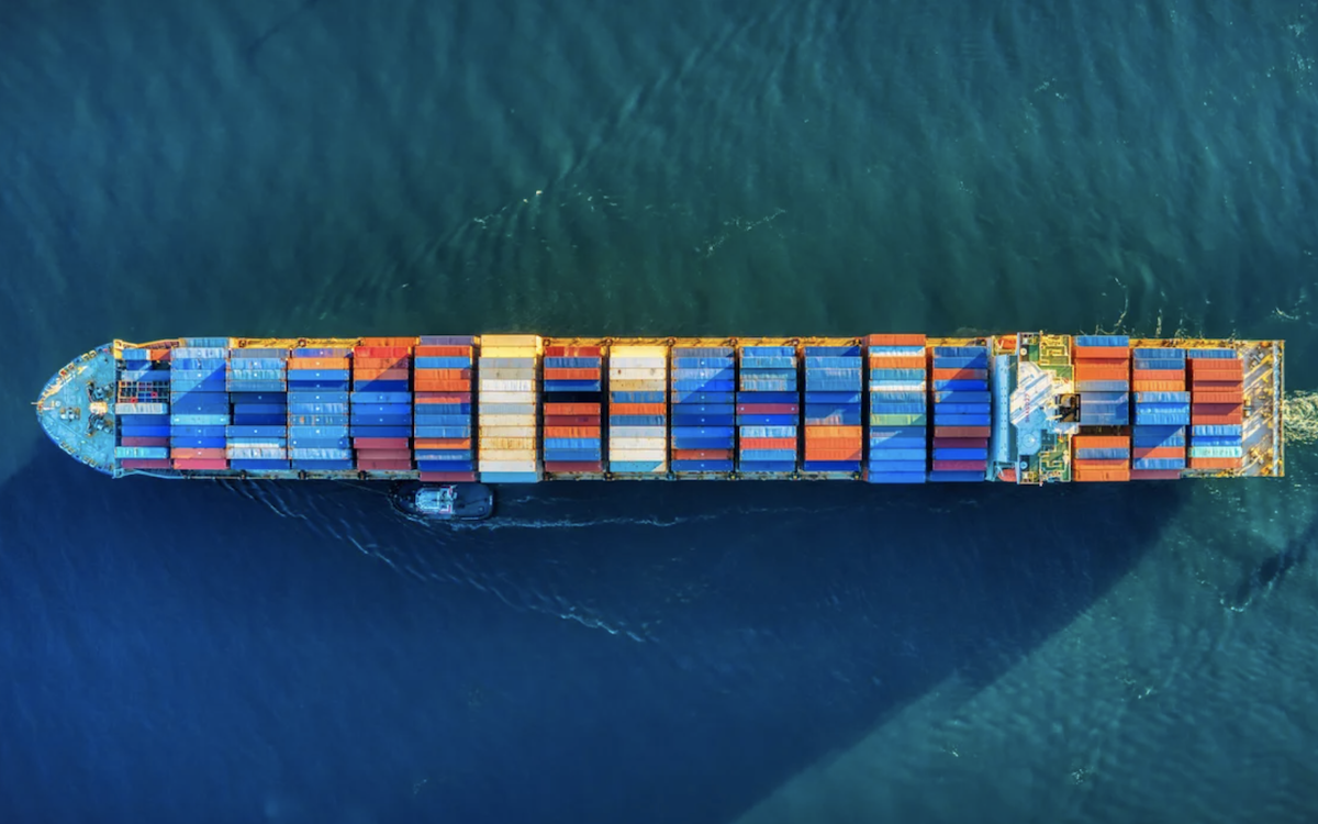 Barge on the water carrying shipping containers