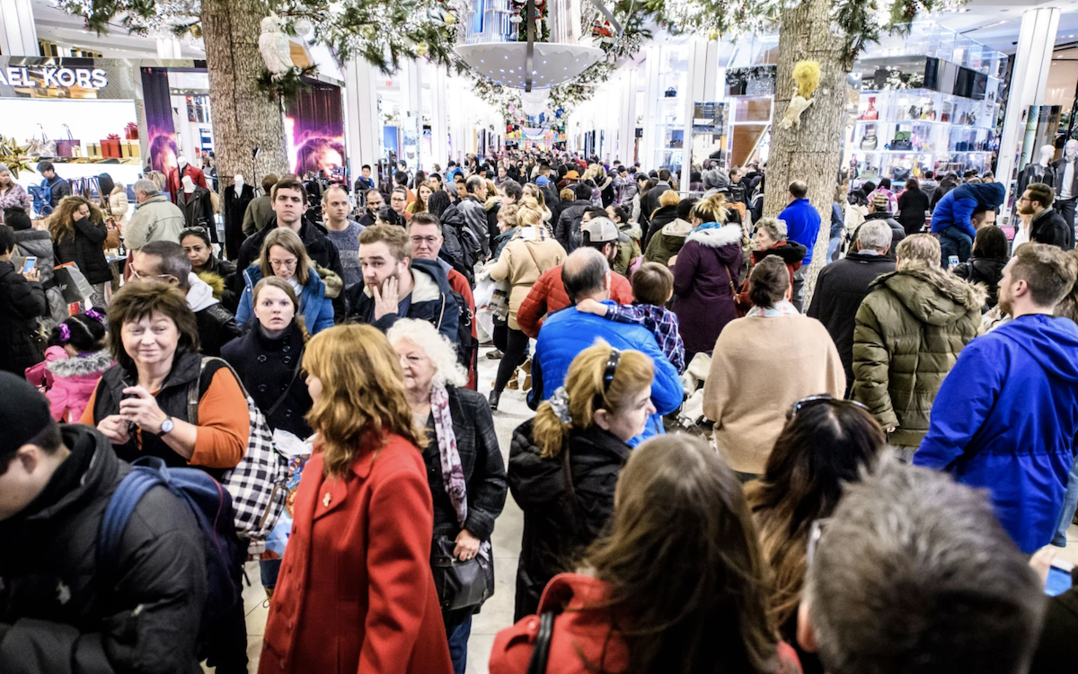 Crowd of shoppers in a mall at wintertime