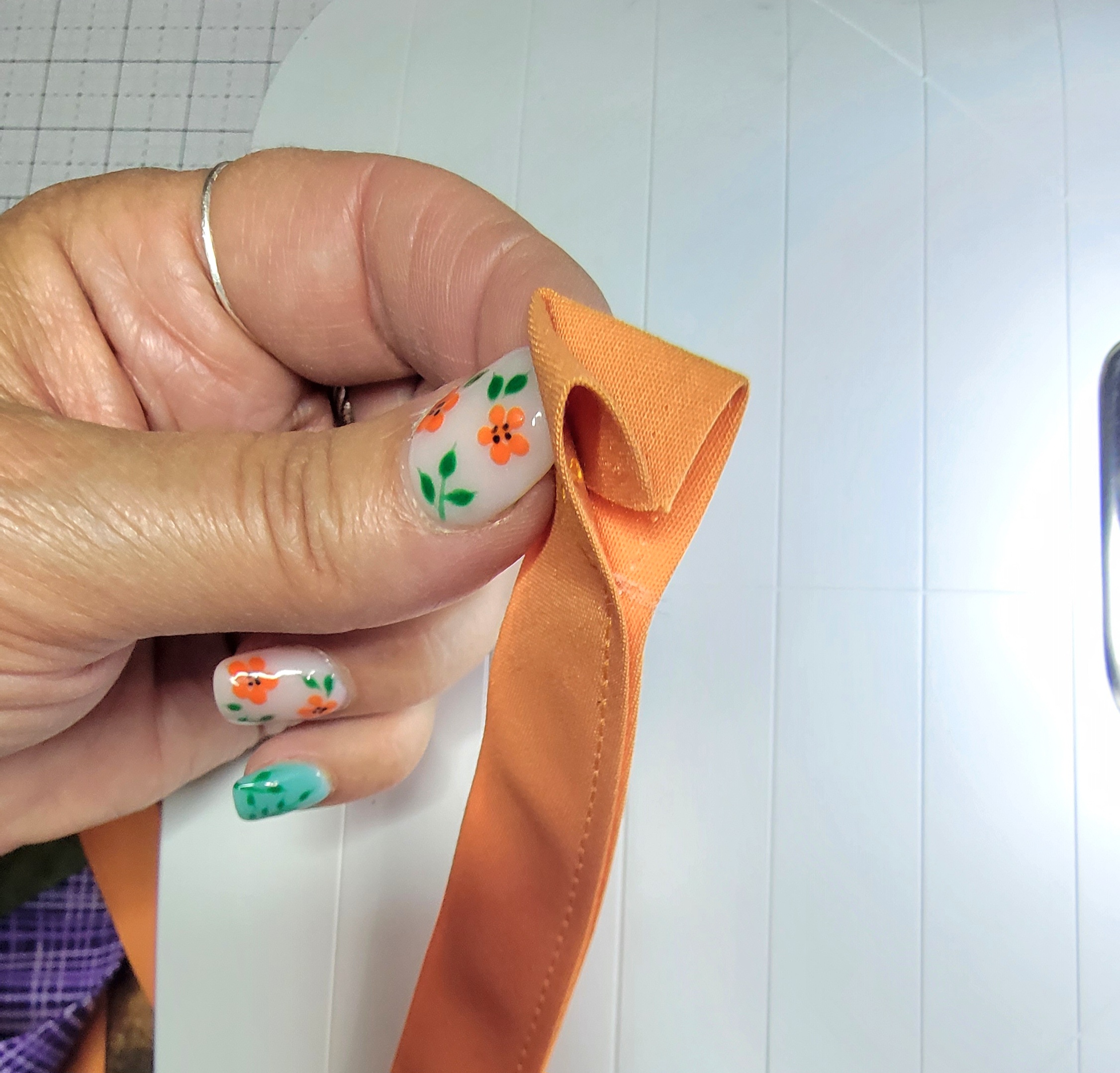 sewing bias tape onto pennant flag banner