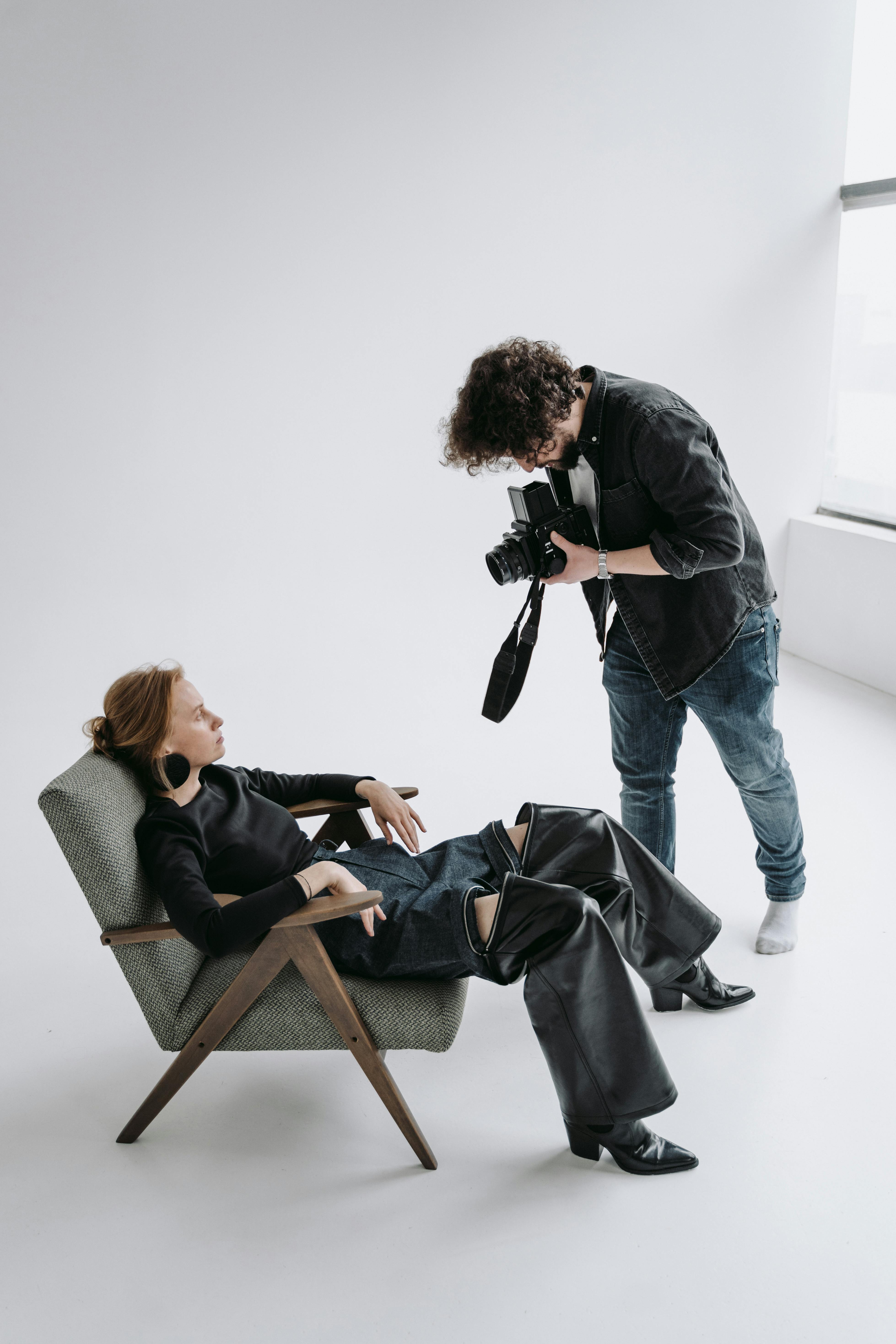 photographer and model doing a fashion photography photographer and model doing a fashion photography