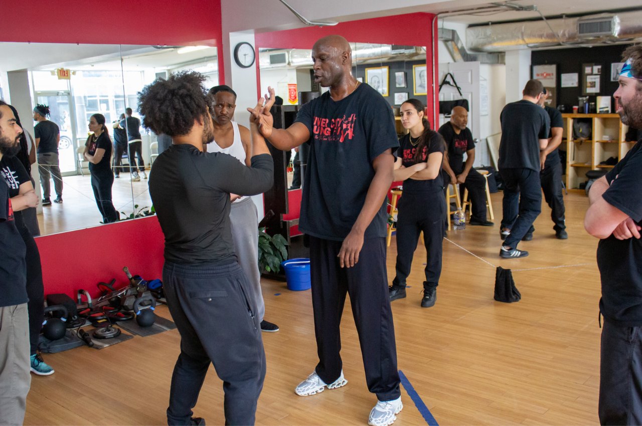 Martial arts instructor with kids
