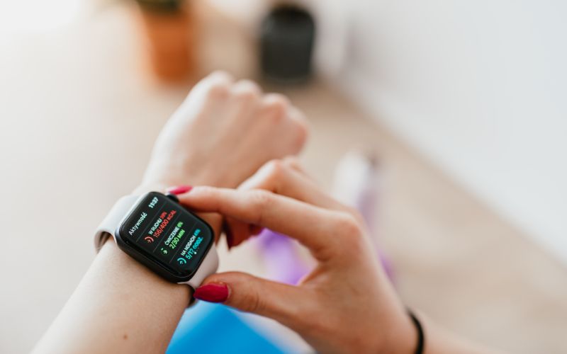 Individual checking their smart watch